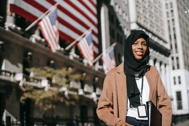 Muslim woman near American embassy; image by Ono Kosuki, via Pexels.com.